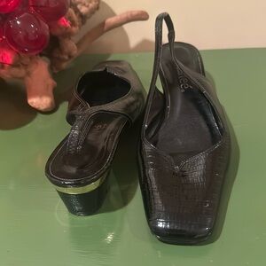 Renee’ black patented shoes with fold on the heal